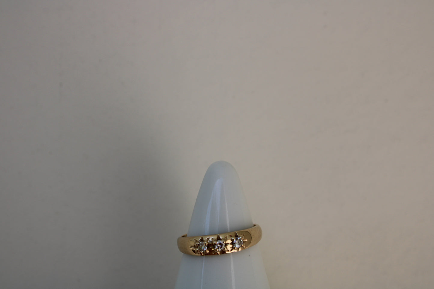 Inspired by a sweet, timeless vintage pinky ring. Three adorable diamonds starset into a perfectly stackable everyday gold ring. Solid 10k recycled gold (hallmarked) - 3 VS1 lab grown diamonds, 2mm diameter (emerald pricing available upon request.)