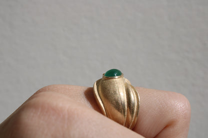 Toi et moi rings: the most romantic of rings. Symbolizing two parts of a whole, or symbolizing the interconnected nature of our internal tensions. I think there's something scared about this type of interlocking geometry and there's an infinite world of glamour inside of this specific form.&nbsp; Natural Colombian emeralds nestled in nearly raw recycled 10k gold are pictured.