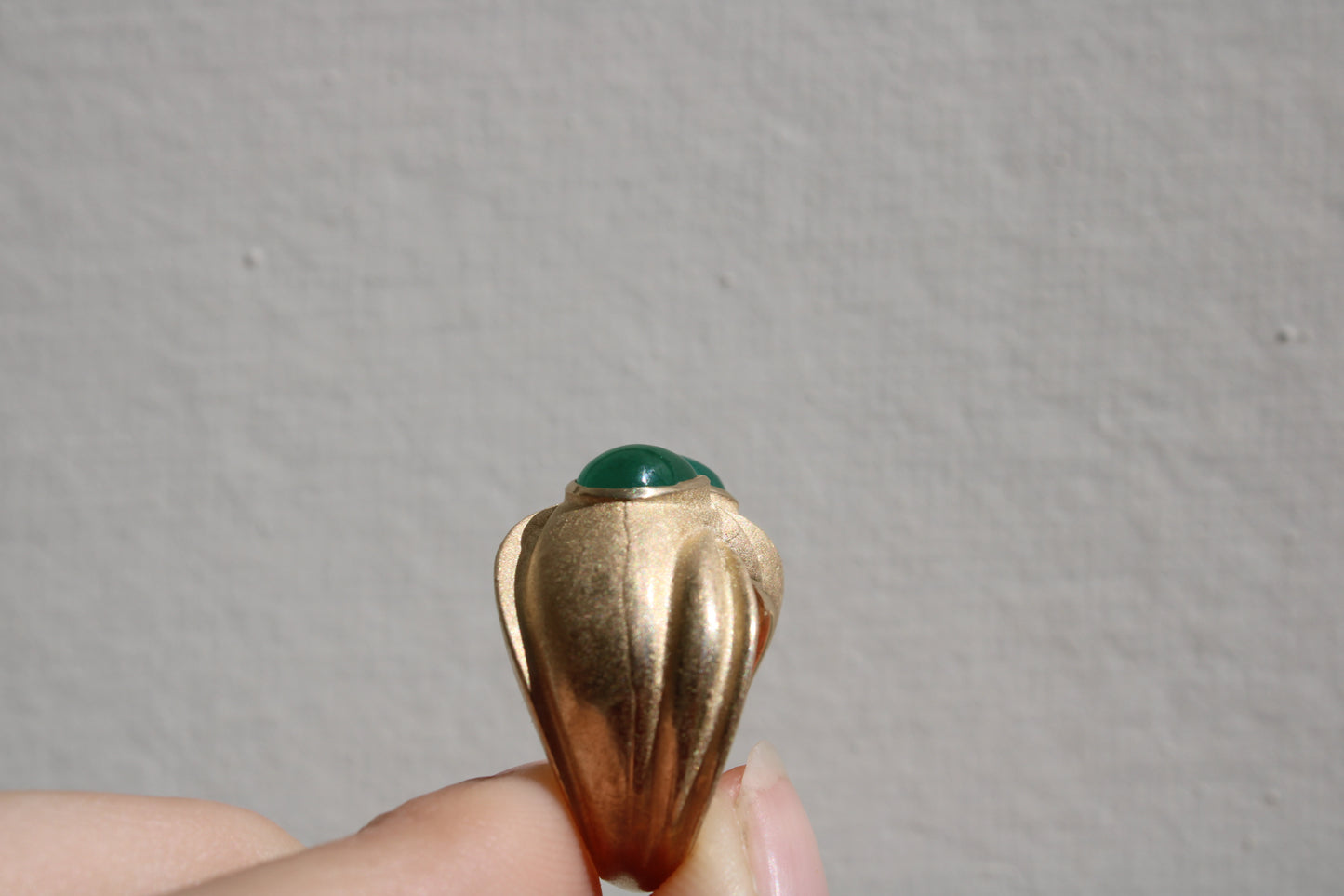Toi et moi rings: the most romantic of rings. Symbolizing two parts of a whole, or symbolizing the interconnected nature of our internal tensions. I think there's something scared about this type of interlocking geometry and there's an infinite world of glamour inside of this specific form.&nbsp; Natural Colombian emeralds nestled in nearly raw recycled 10k gold are pictured.