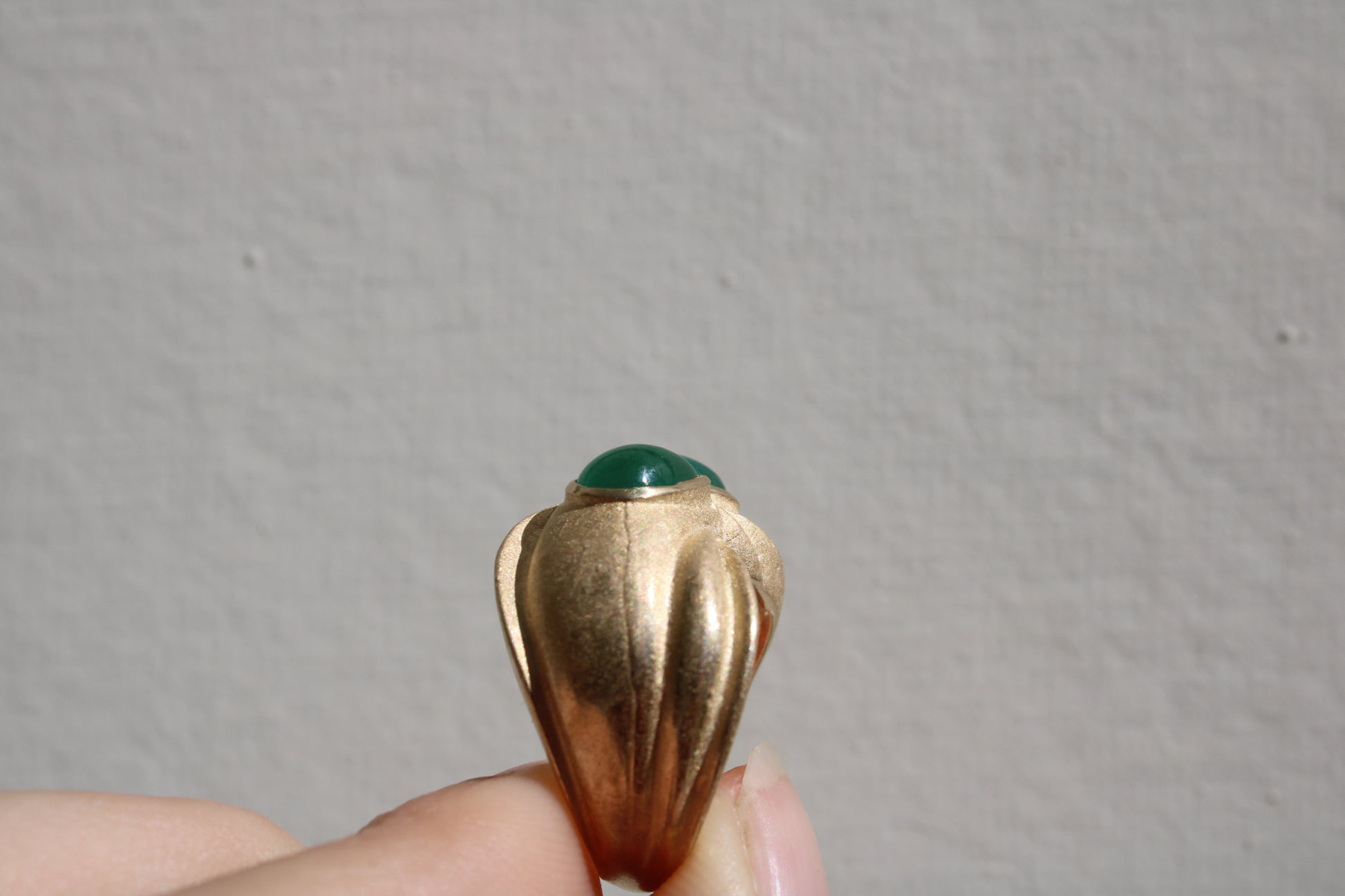 Toi et moi rings: the most romantic of rings. Symbolizing two parts of a whole, or symbolizing the interconnected nature of our internal tensions. I think there's something scared about this type of interlocking geometry and there's an infinite world of glamour inside of this specific form.&nbsp; Natural Colombian emeralds nestled in nearly raw recycled 10k gold are pictured.